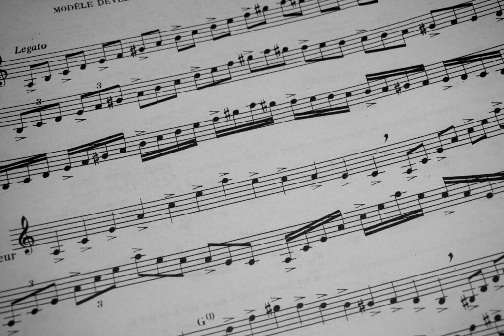 Detailed view of sheet music featuring musical notations and symbols.